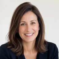 Portrait of a smiling customer with dark hair